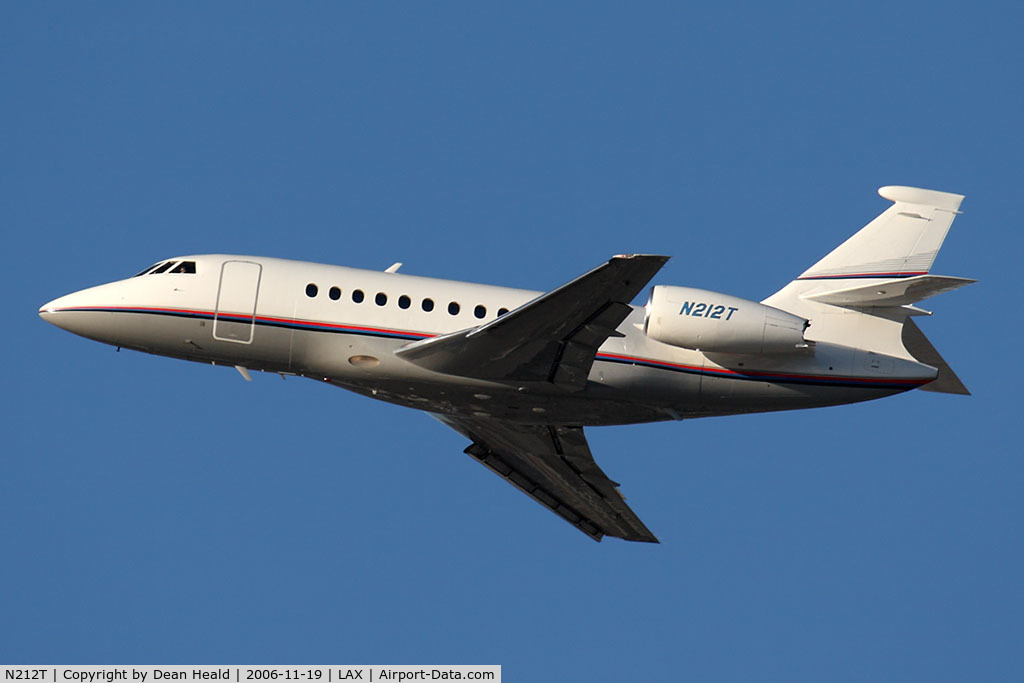 N212T, Dassault Falcon 2000 C/N 052, AT&T Corporation's 1997 Dassault Falcon 2000 N212T climbing out from RWY 25R.