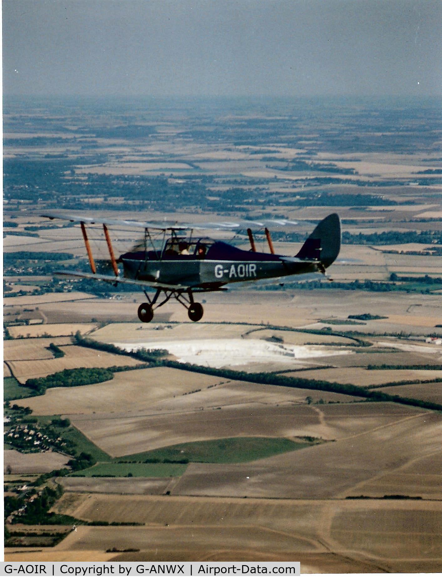 G-AOIR, 1943 Thruxton Jackaroo C/N 82882, Seen over Cambridgeshire countryside C1992 whilst being flown by Les Smith.