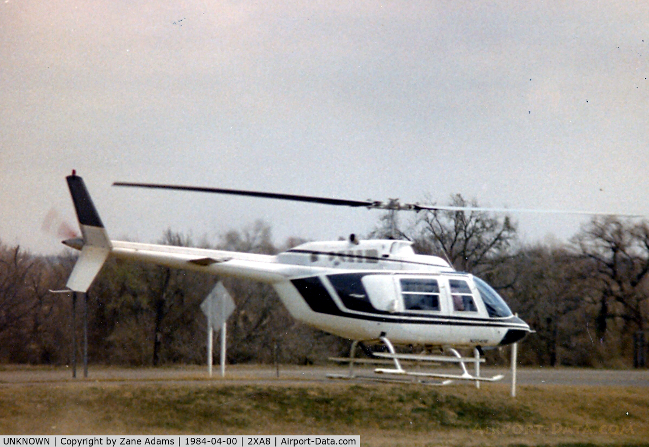 UNKNOWN, Helicopters Various C/N unknown, Bell 206 landing at Sam's Motel along I-45 near Farifield, TX