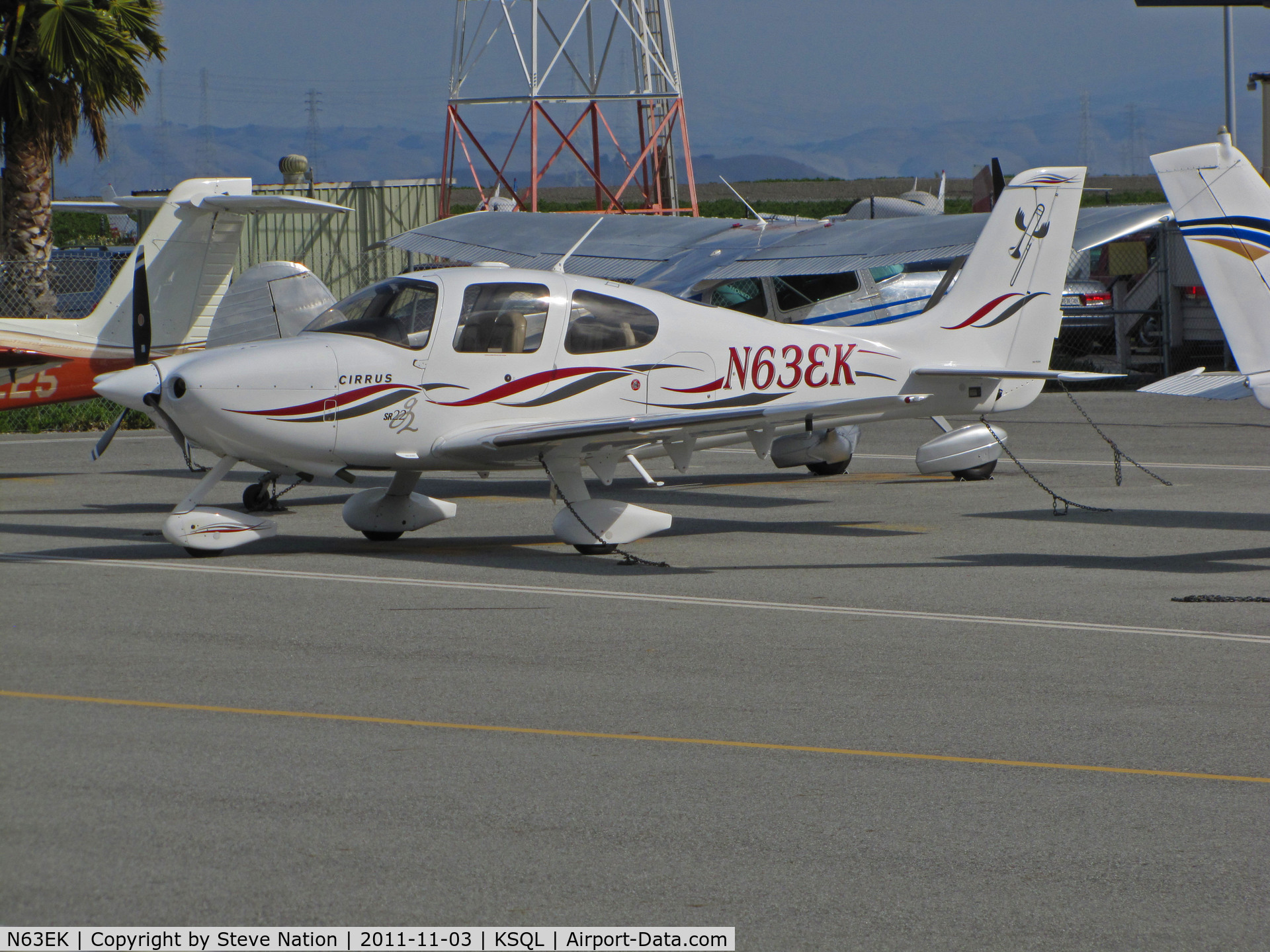 N63EK, 2004 Cirrus SR22 C/N 1095, Big George Aviation (Stateline, NV) 2004 Cirrus Design SR22 with flying trombone logo on tail (port side only) at San Carlos, CA