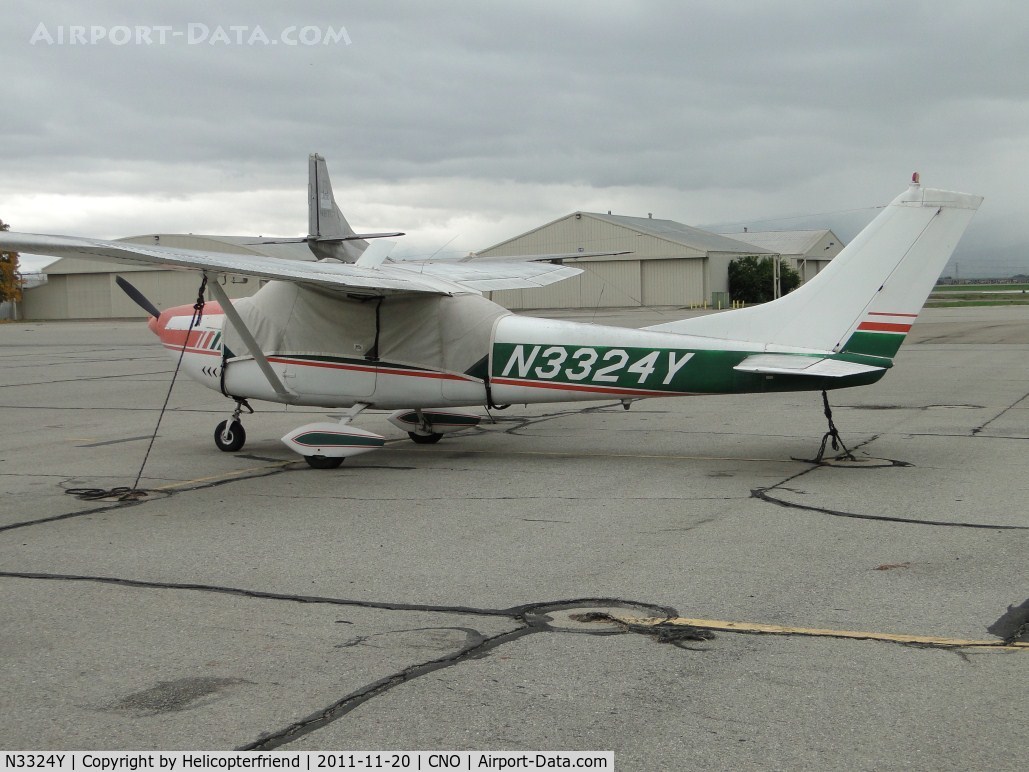 N3324Y, 1962 Cessna 182E Skylane C/N 18254324, Covered up, tied down and waiting for the rain