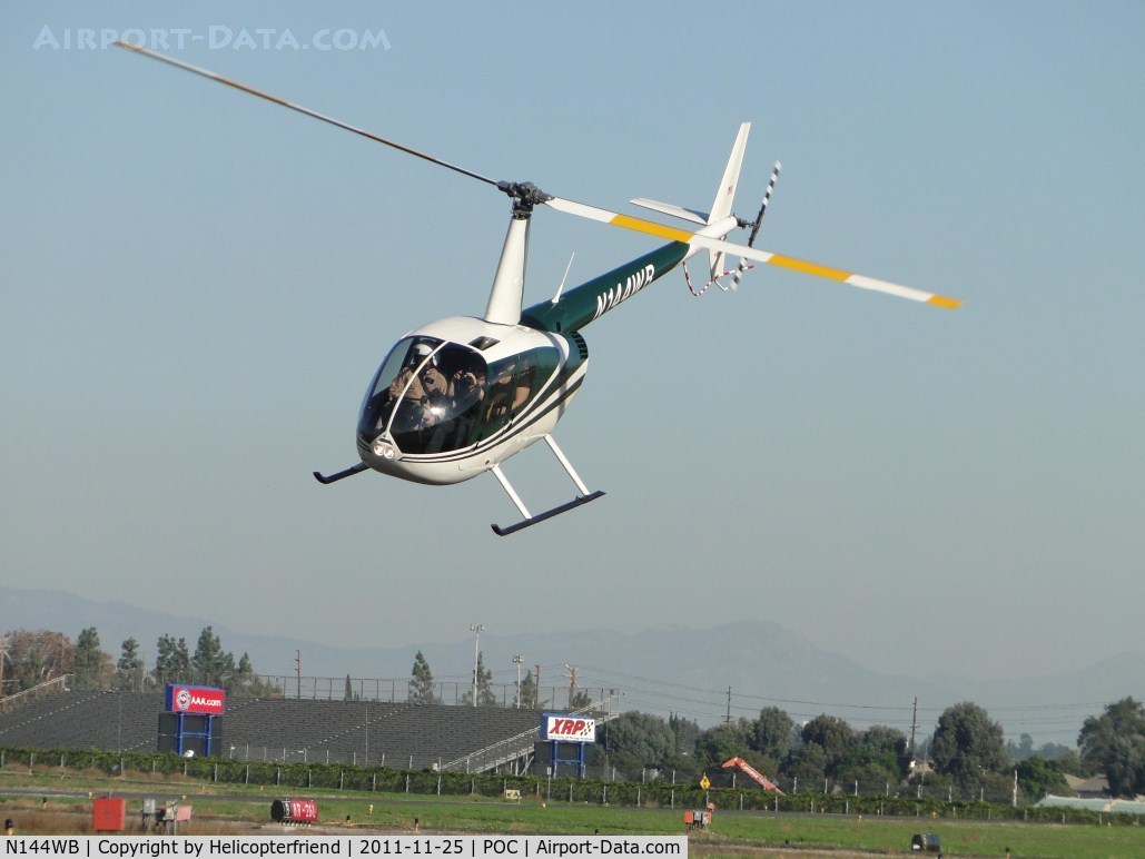 N144WB, 1998 Robinson R44 C/N 0545, All passengers aboard, nose down and heading westbound