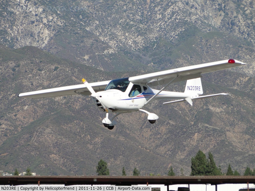 N203RE, 2007 Remos G-3/600 Mirage C/N 203, Fighting the wind on final to runway 24