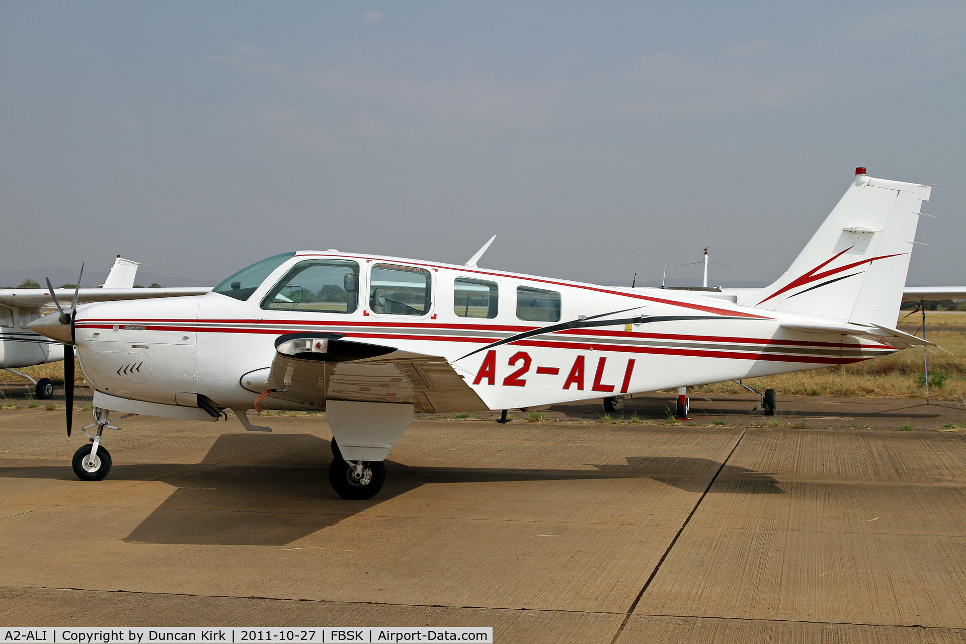 A2-ALI, 1981 Beech A36 Bonanza 36 C/N E-1942, Nicely situated for photography in the morning sunlight