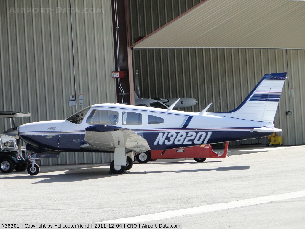 N38201, Piper PA-28R-201T Cherokee Arrow III C/N 28R-7703188, Parked at hanger and getting ready to depart