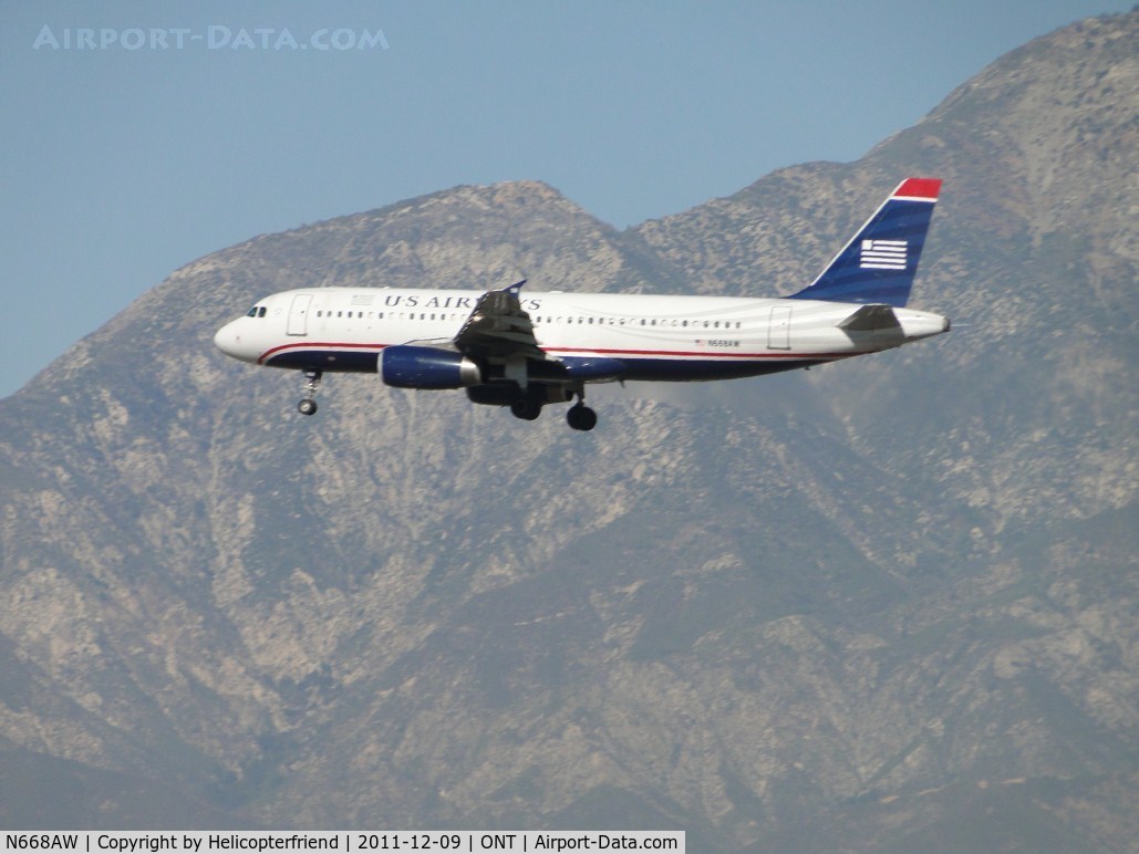 N668AW, 2002 Airbus A320-232 C/N 1764, On final for runway 26