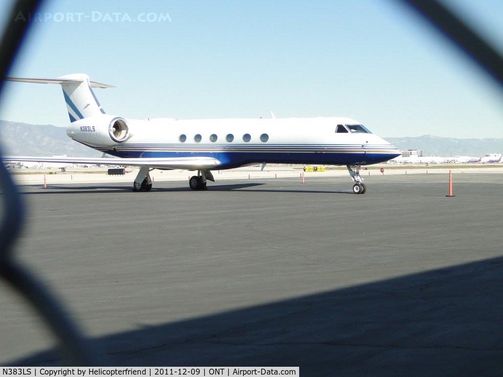 N383LS, 1998 Gulfstream Aerospace G-IV C/N 544, Couldn't get close enough to ship, took photo through fence at parking area