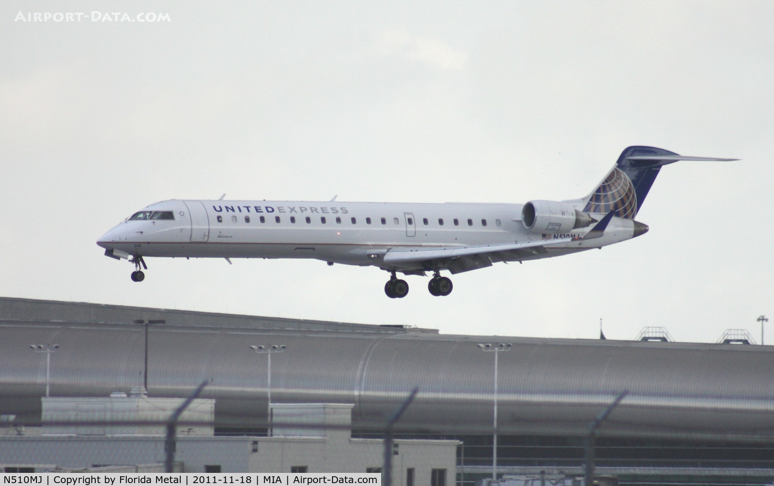 N510MJ, 2003 Bombardier CRJ-700 (CL-600-2C10) Regional Jet C/N 10101, United Express new colors CRJ-700 landing Runway 30