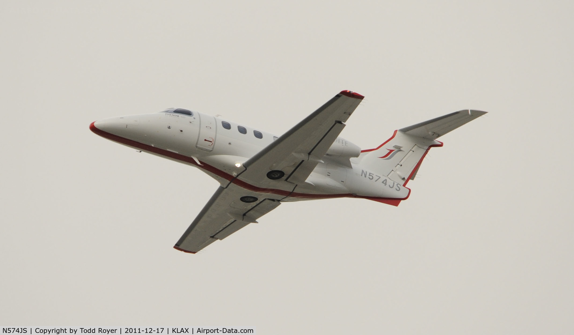 N574JS, 2009 Embraer EMB-500 Phenom 100 C/N 50000046, Departing LAX