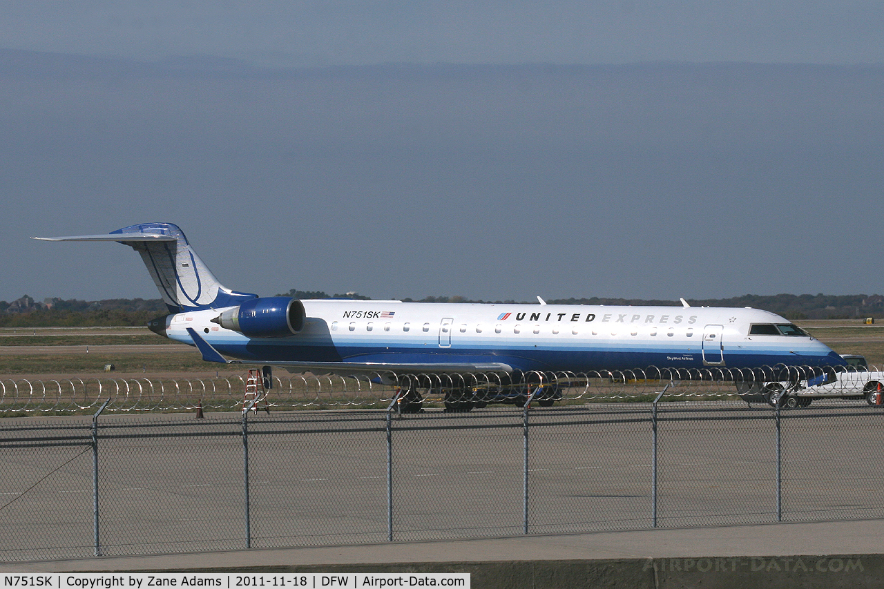 N751SK, 2005 Bombardier CRJ-701ER (CL-600-2C10) Regional Jet C/N 10208, United Express at DFW Airport