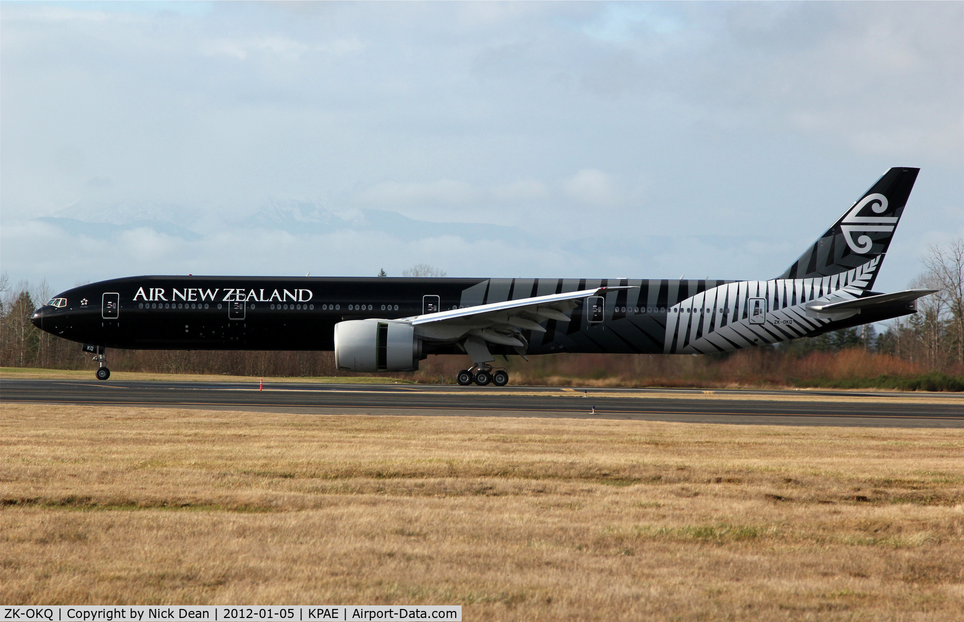 ZK-OKQ, 2011 Boeing 777-306/ER C/N 40689, KPAE/PAE Boeing 055 Air New Zealands latest 777-300 in this stunning All Blacks Rugby Union colour scheme returns to 16R after a KPAE-KPAE test flight, All Blacks winners of the Rugby world cup 2011