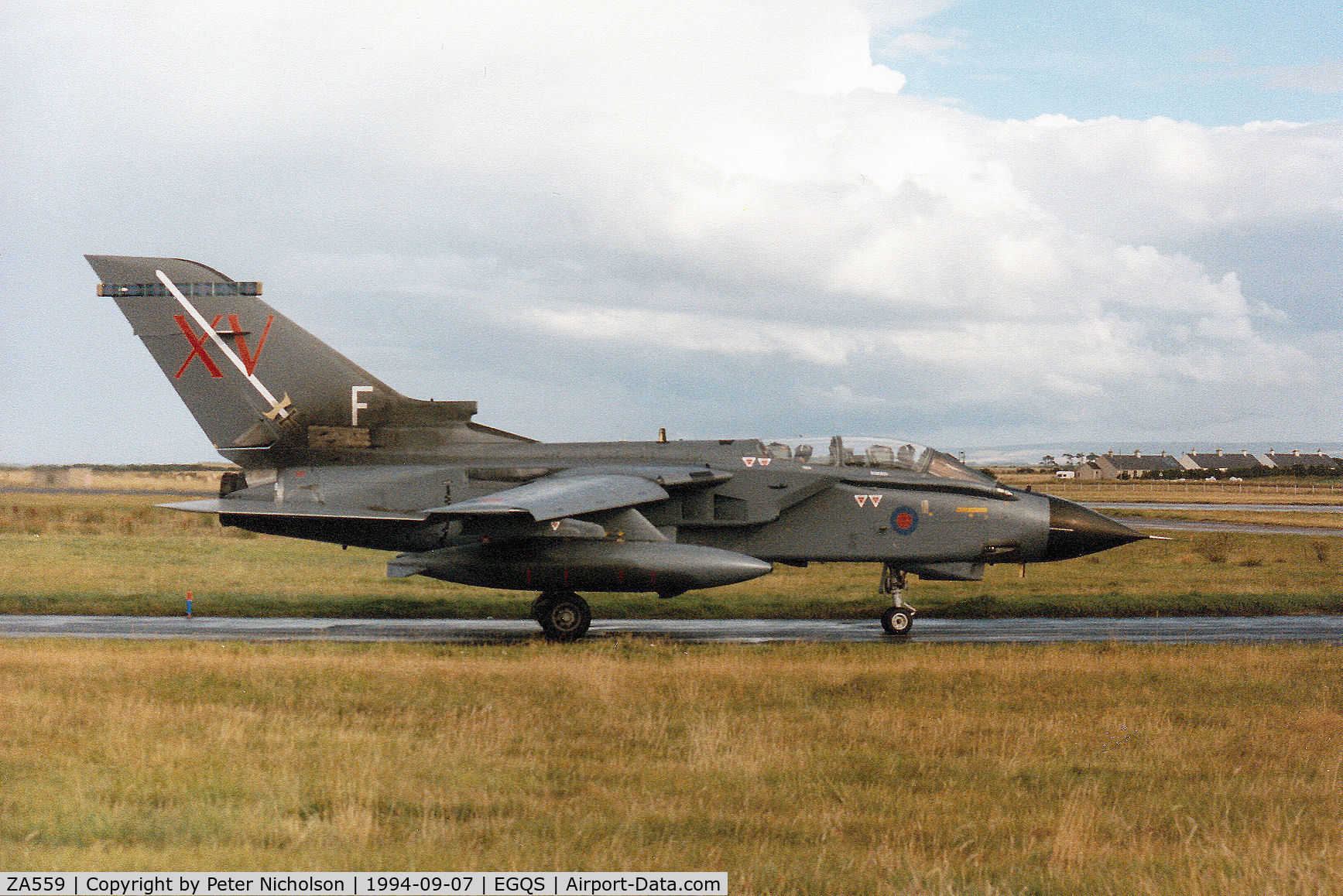 ZA559, 1981 Panavia 081/BS023/3043 C/N 081/BS023/3043, Tornado GR.1, callsign Mitre 3, of 15(Reserve) Squadron awaiting clearance to join Runway 05 at RAF Lossiemouth in September 1994.