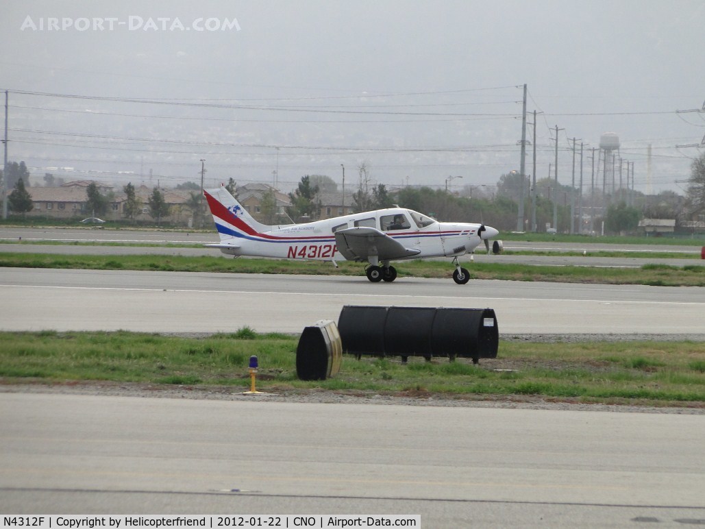 N4312F, 1977 Piper PA-28-181 Archer II C/N 287790010, Rolling out after landing
