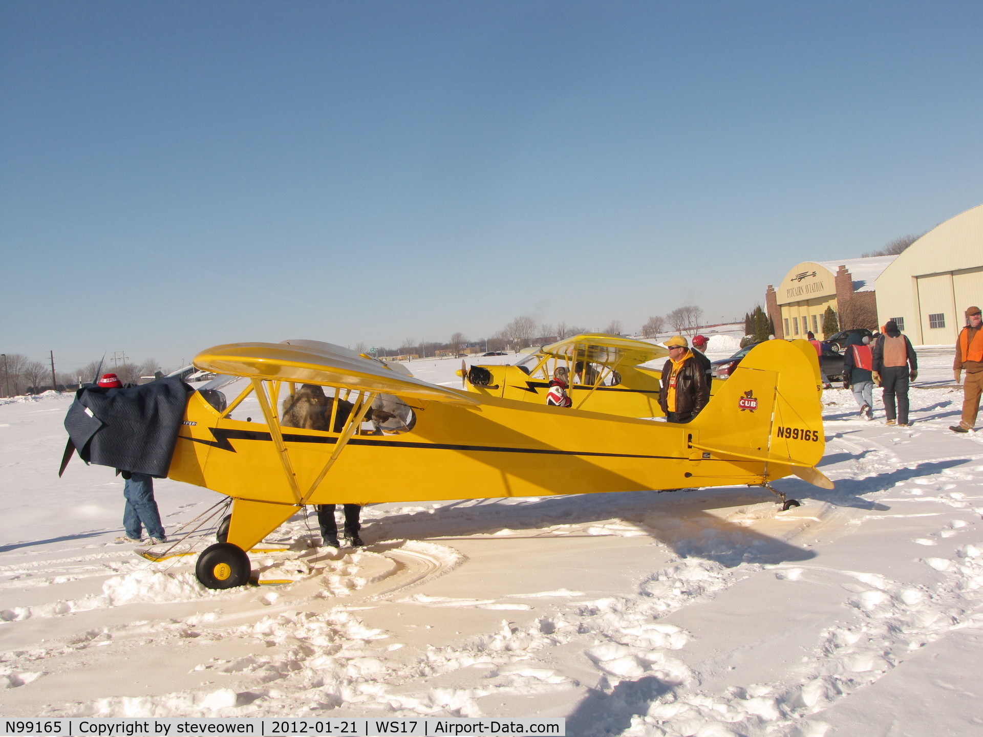 N99165, 1950 Piper J3C-65 Cub Cub C/N 16741, Staying warm at Pioneer Airport Ski Plane fly-in
