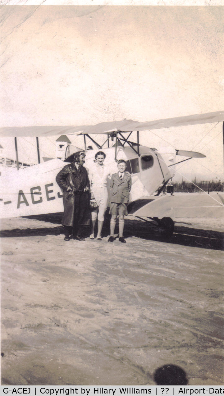 G-ACEJ, 1933 De Havilland DH.83 Fox Moth C/N 4069, This was in a collection of photographs belonging to my late Aunt. No idea who or where the people are but I guess the aircraft would not have been too old then.  Any information gratefully received!!