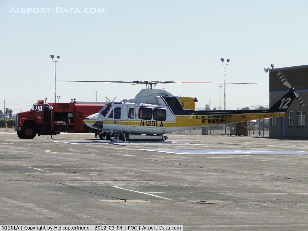 N120LA, 2007 Bell 412EP C/N 36455, Being re-fueled hot and getting ready to respond to a call out