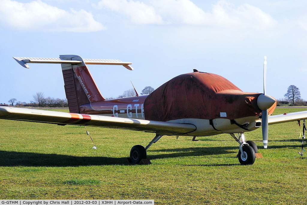 G-GTHM, 1981 Piper PA-38-112 Tomahawk Tomahawk C/N 38-81A0171, at Hinton in the Hedges