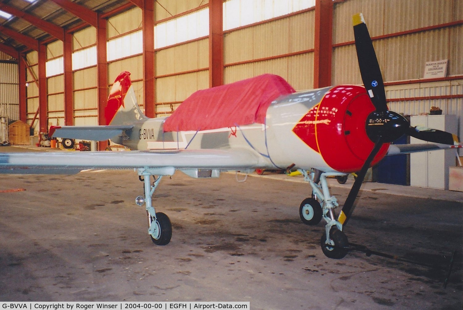 G-BVVA, 1987 Bacau Yak-52 C/N 877610, Based at Swansea Airport. Photo taken circa August 2004 soon after receiving a new camouflage scheme.