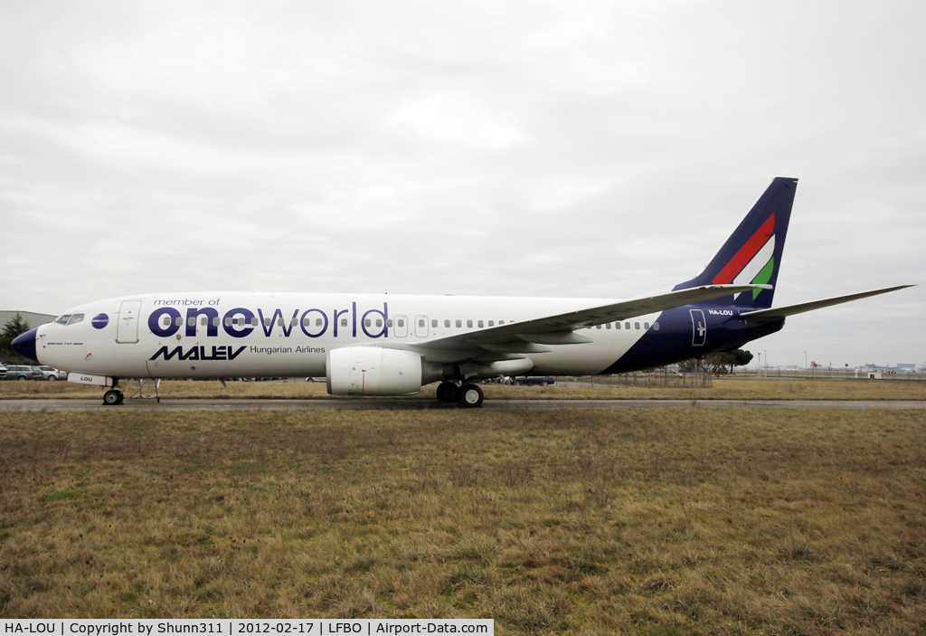 HA-LOU, 2005 Boeing 737-8Q8 C/N 30684, Stored at Latécoère Aeroservices after bankrupt... Still in 'One World' c/s