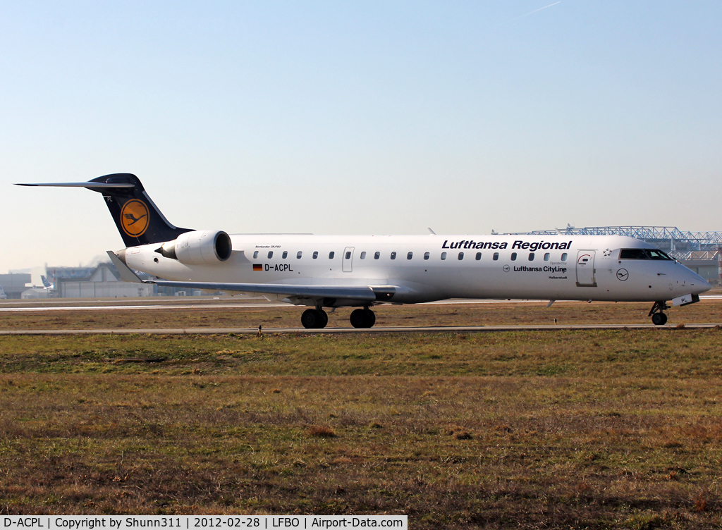 D-ACPL, 2002 Canadair CRJ-701ER (CL-600-2C10) Regional Jet C/N 10076, Taxiing holding point rwy 14L for departure...