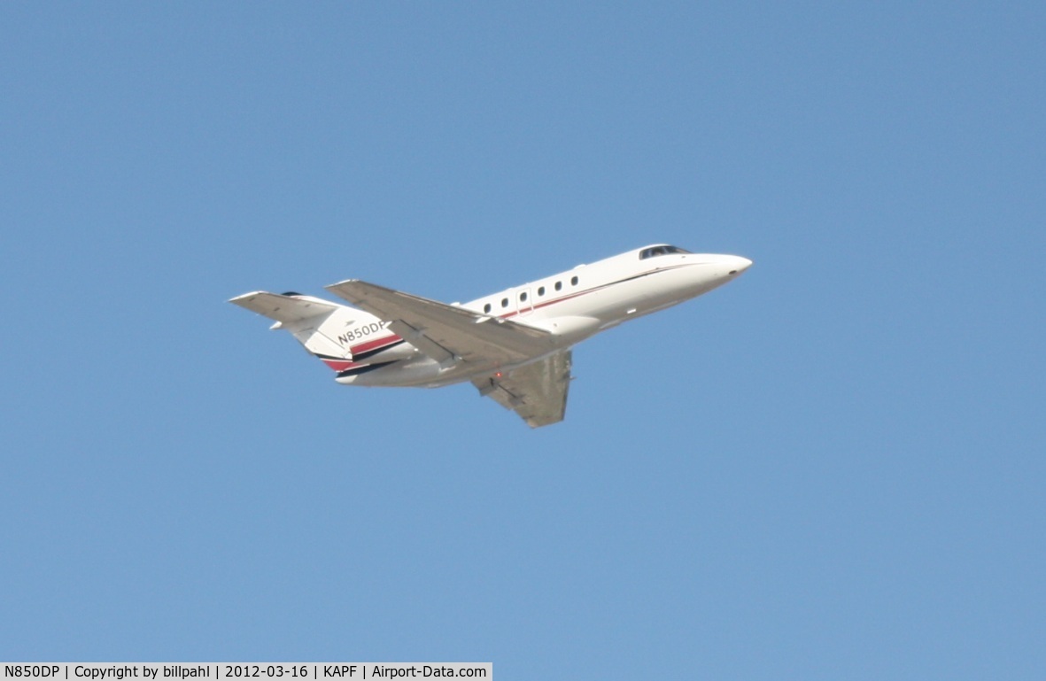 N850DP, 2000 Raytheon Hawker 800XP C/N 258468, Taking off from Naples Municipal 3-16-12 (KAPF)