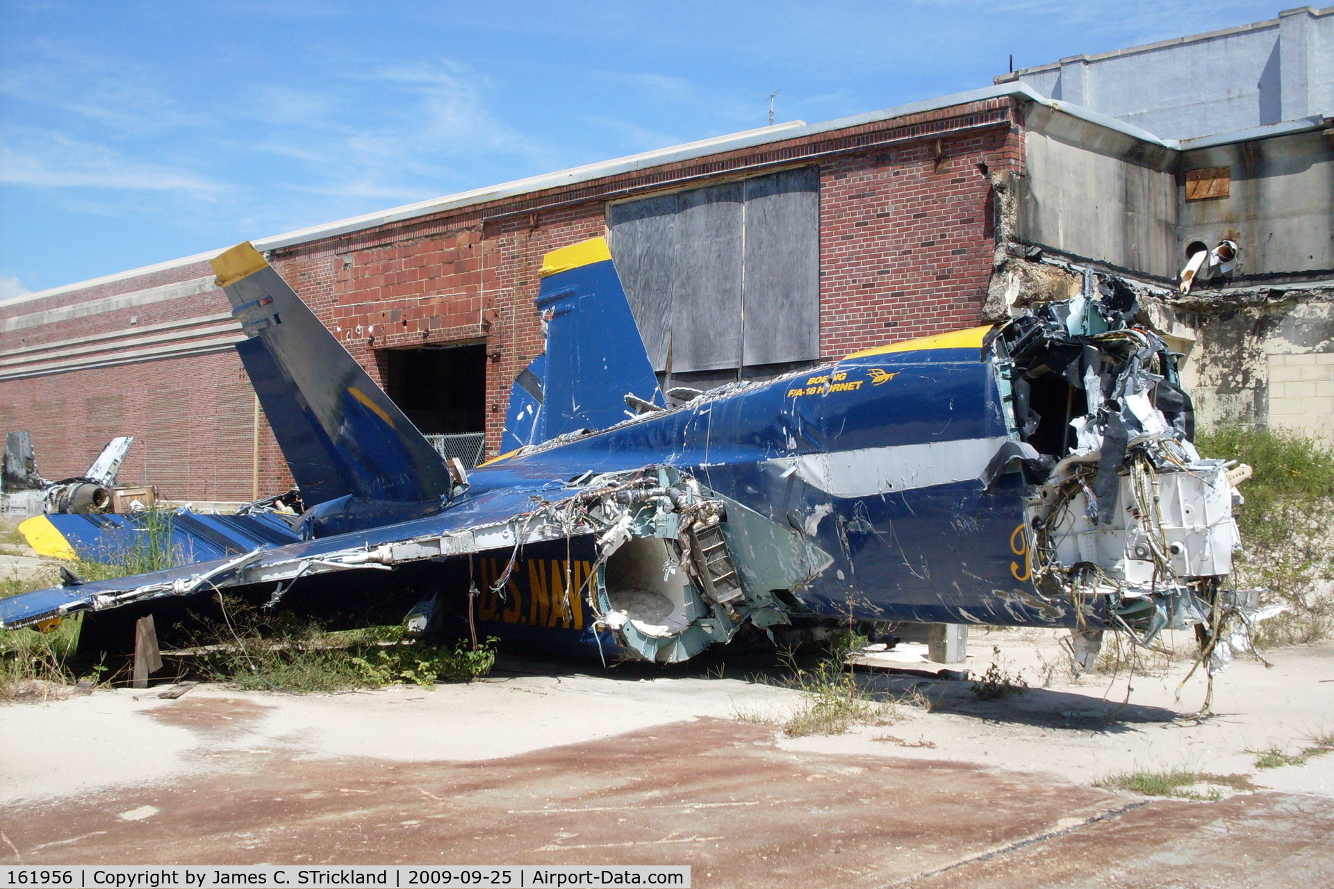 161956, McDonnell Douglas F/A-18A Hornet C/N 0167, The wreckage is stored behind a brick warehouse near the Pensacola NAS Golf Course.