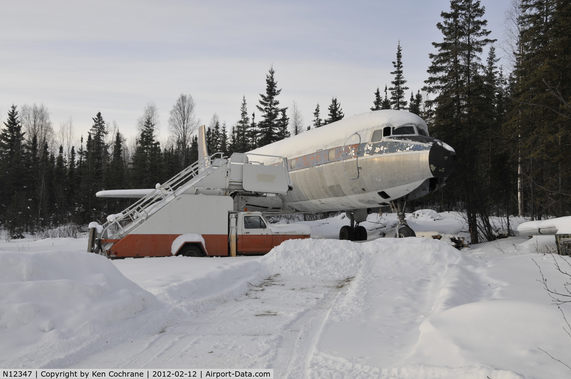 N12347, 1953 Douglas DC-6A C/N 44071, This DC6 is located outside Fairbanks AK along a mountain road.  Photo 2/12/12