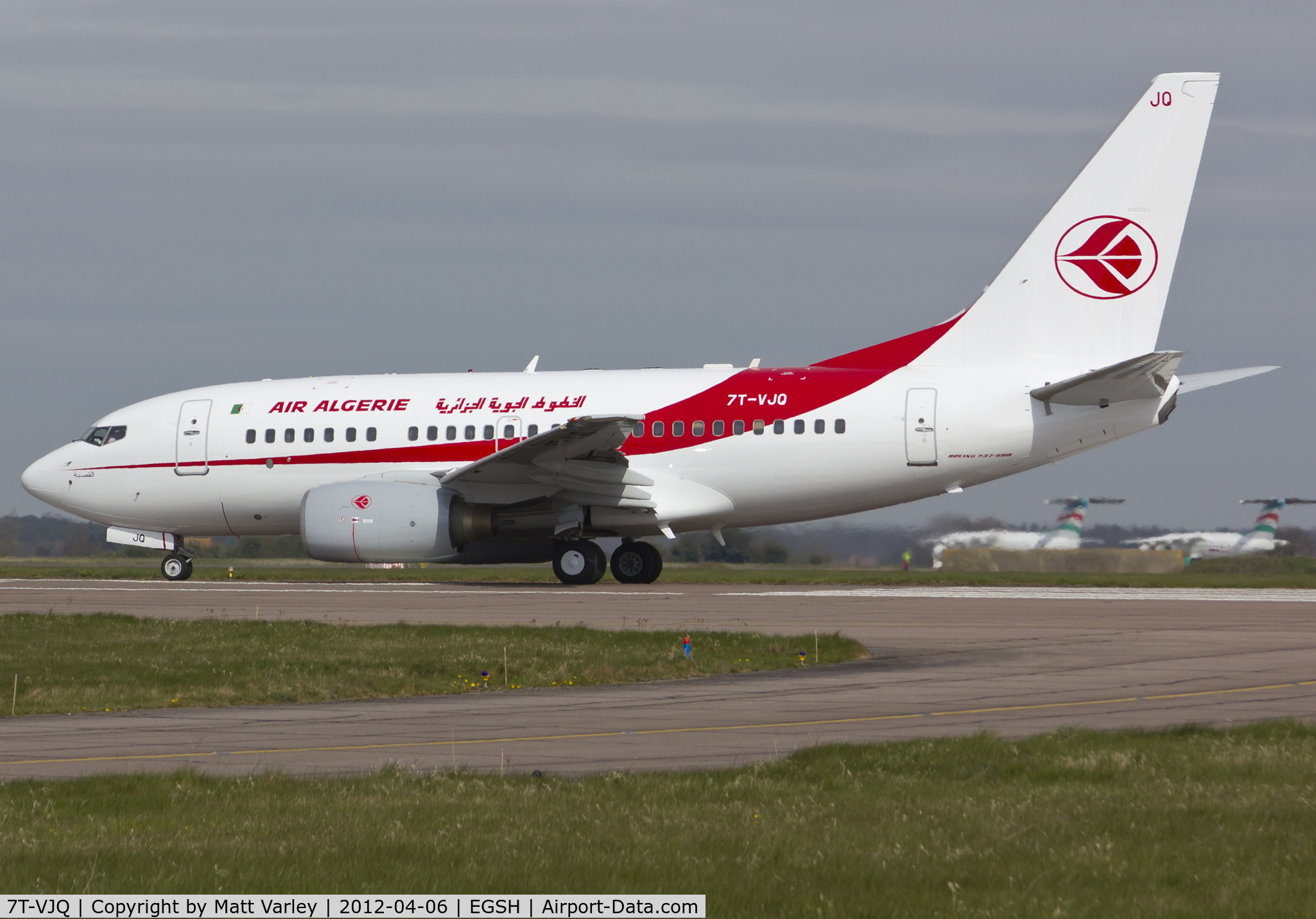 7T-VJQ, 2002 Boeing 737-6D6 C/N 30209, Departing EGSH after spray by Air Livery.