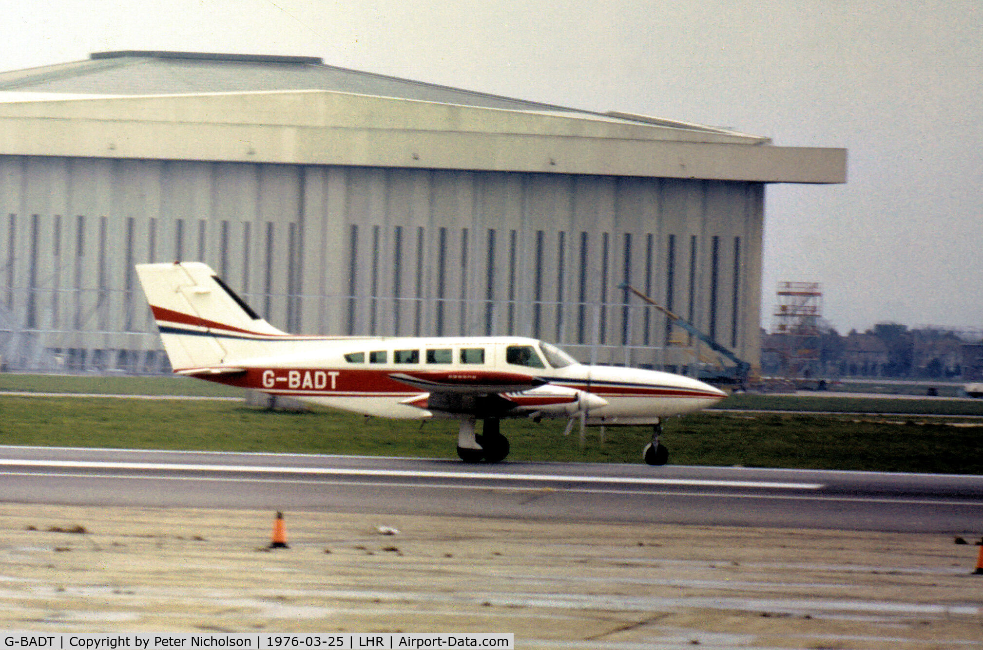 G-BADT, 1972 Cessna 402B C/N 402-0329, Cessna 402B as seen at Heathrow in the Spring of 1976.
