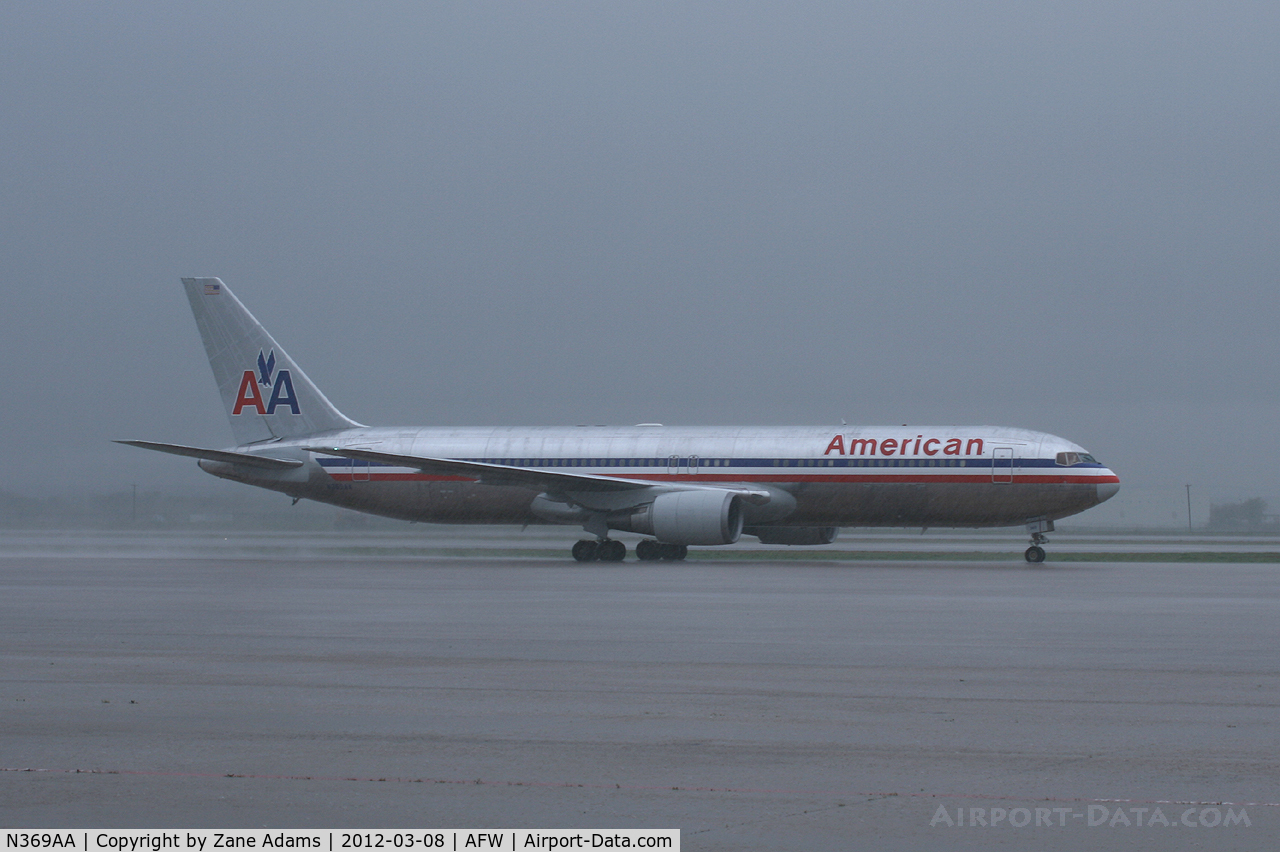 N369AA, 1992 Boeing 767-323 C/N 25196, American Airlines 767 diverted to Alliance Airport during heavy rains.