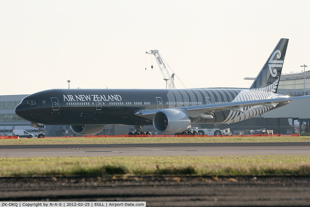 ZK-OKQ, 2011 Boeing 777-306/ER C/N 40689, Sadly backlit, but happy to get the All Blacks