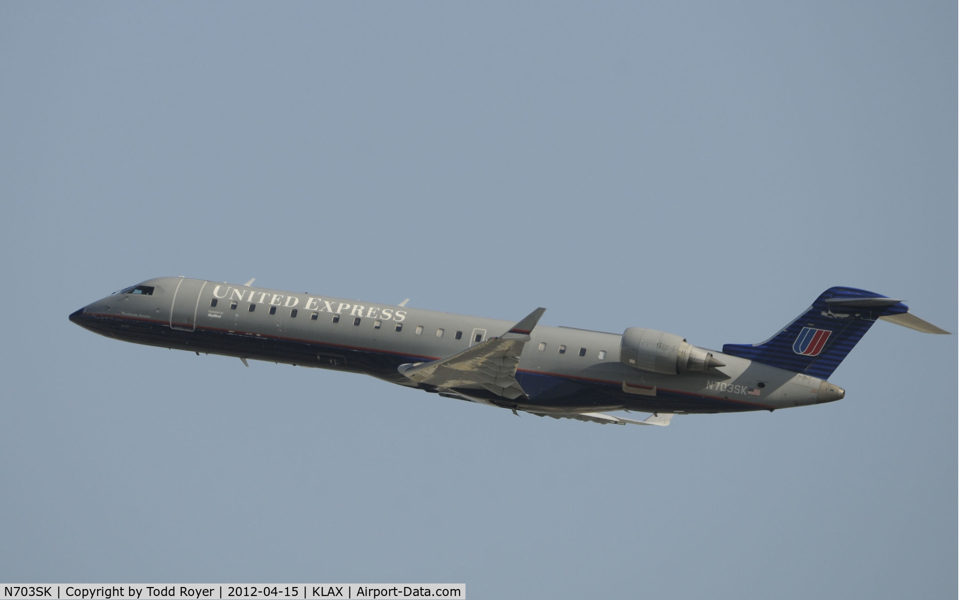 N703SK, 2004 Bombardier CRJ-701ER (CL-600-2C10) Regional Jet C/N 10139, Departing LAX on 25R