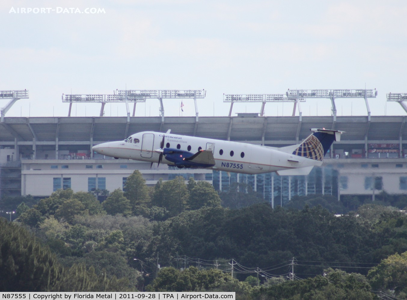 N87555, 1996 Raytheon 1900D C/N UE-234, Continental Connection B1900D in front of Raymond James Stadium
