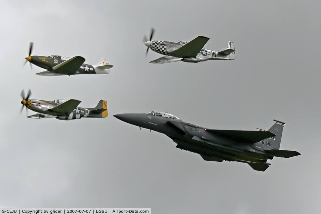 G-CEJU, Bell P-39Q Airacobra C/N 26E-397, Pretty neat formation the F15 illustrating the size difference between WW2 and now!