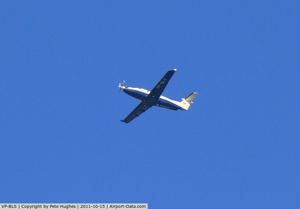 VP-BLS, 1997 Pilatus PC-12/45 C/N 176, VP-BLS PC12  climbing overhead Silchester after departure from Farnborough