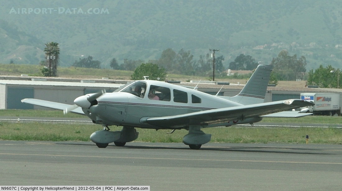 N9607C, 1978 Piper PA-28-181 C/N 28-7890429, Waiting to enter taxiway Sierra