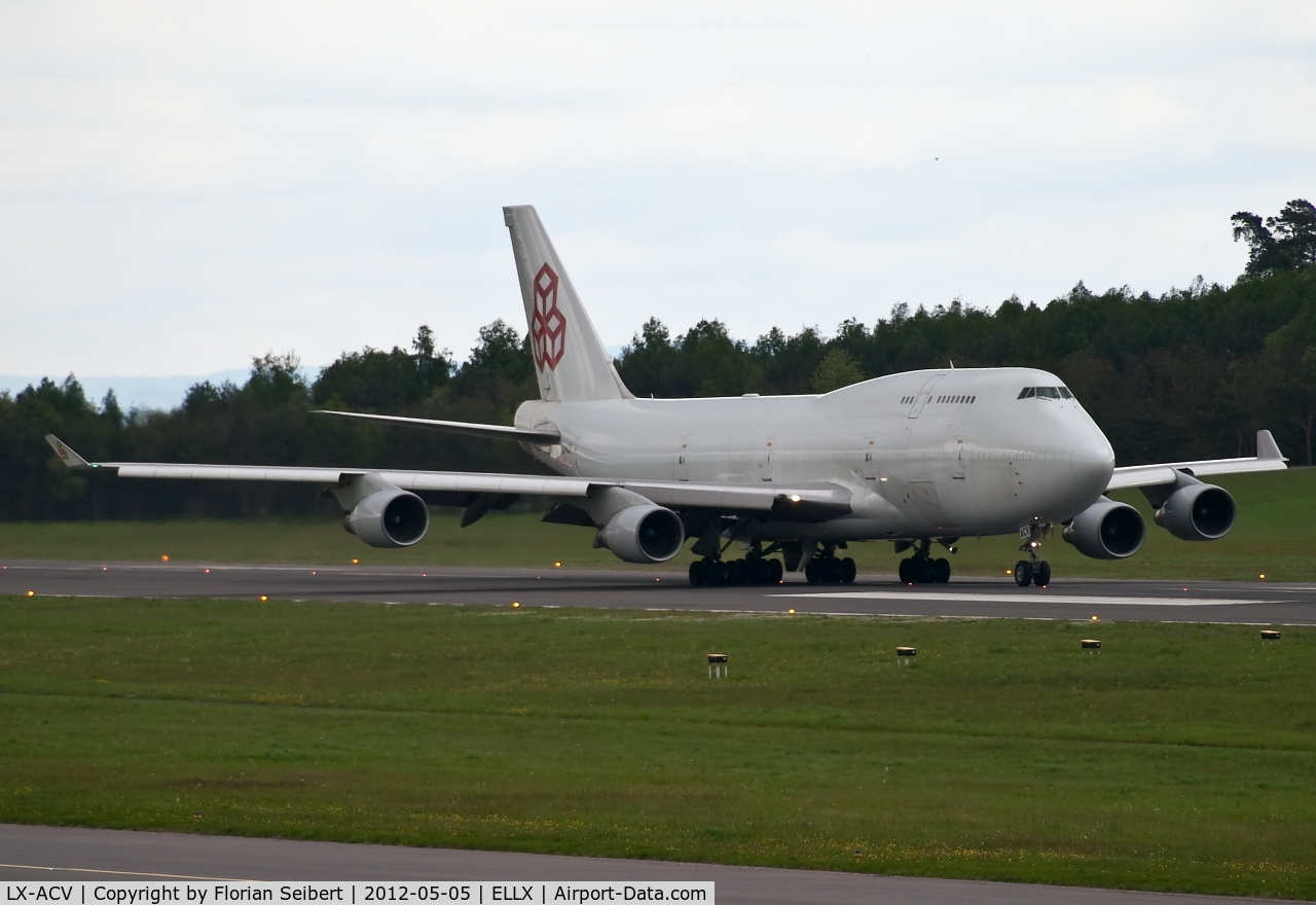 LX-ACV, 1989 Boeing 747-4B5/BCF C/N 24200, taking off rwy 24