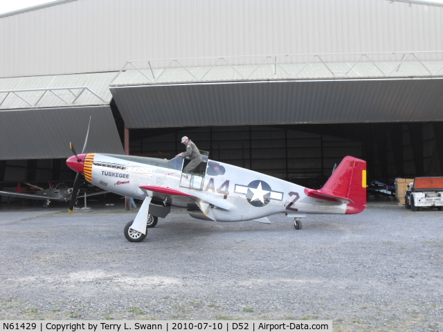 N61429, 1942 North American P-51C Mustang C/N 103-26199, Tuskegee P-51C parked at Geneseo, NY Air Show in 2010.