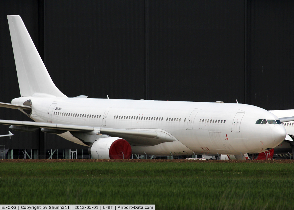 EI-CXG, 2000 Airbus A330-223 C/N 364, Stored in all white without titles...