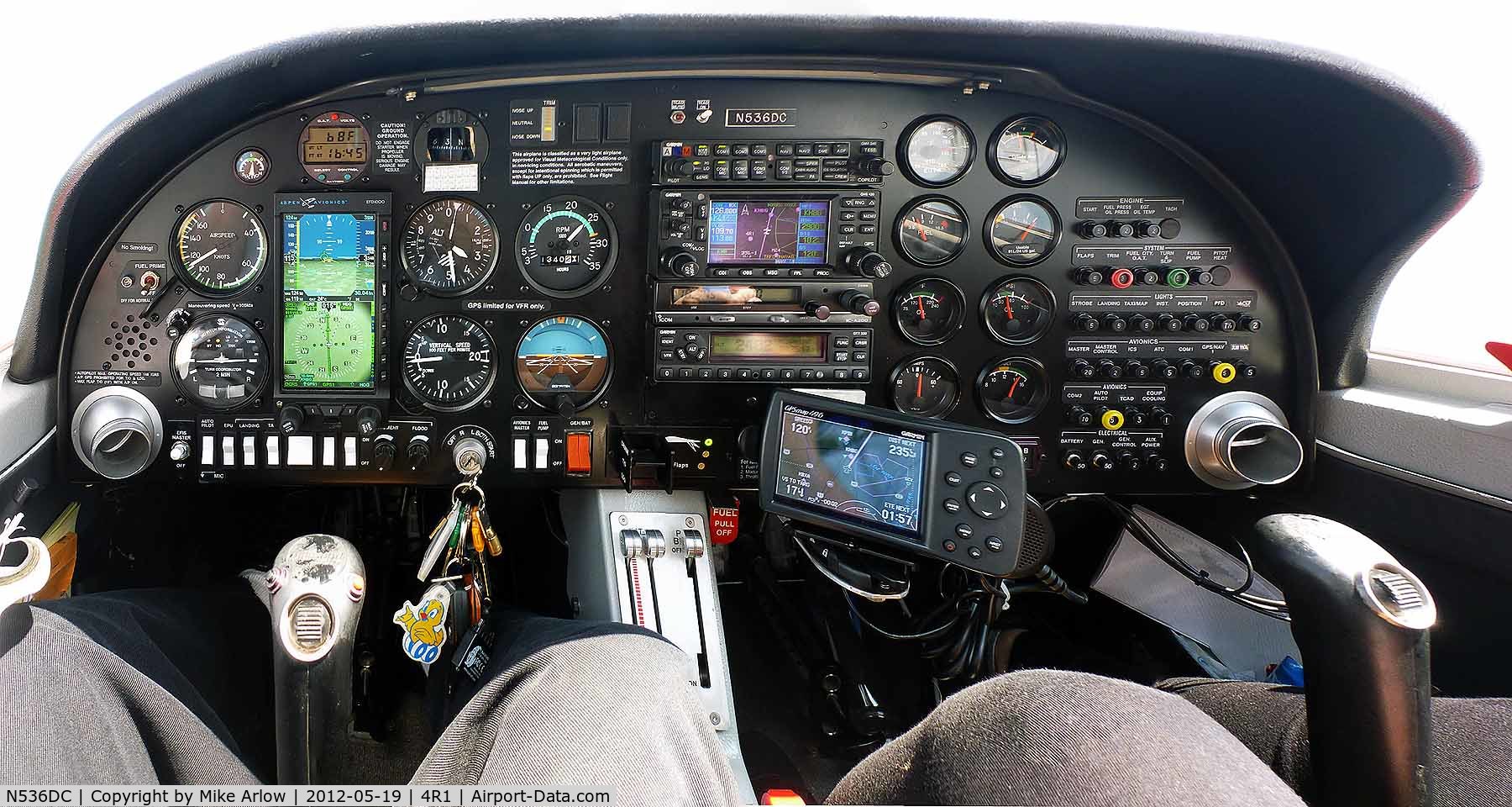 N536DC, 2003 Diamond DA-20C-1 Eclipse C/N C0236, Cockpit panorama view showing synthetic vision on Aspen PFD1000, T-CAS on Aspen PFD 1000, and ATC radar on Garmin 430W GPS with weather and terrain, and backup Garmin 496 with weather and terrain.