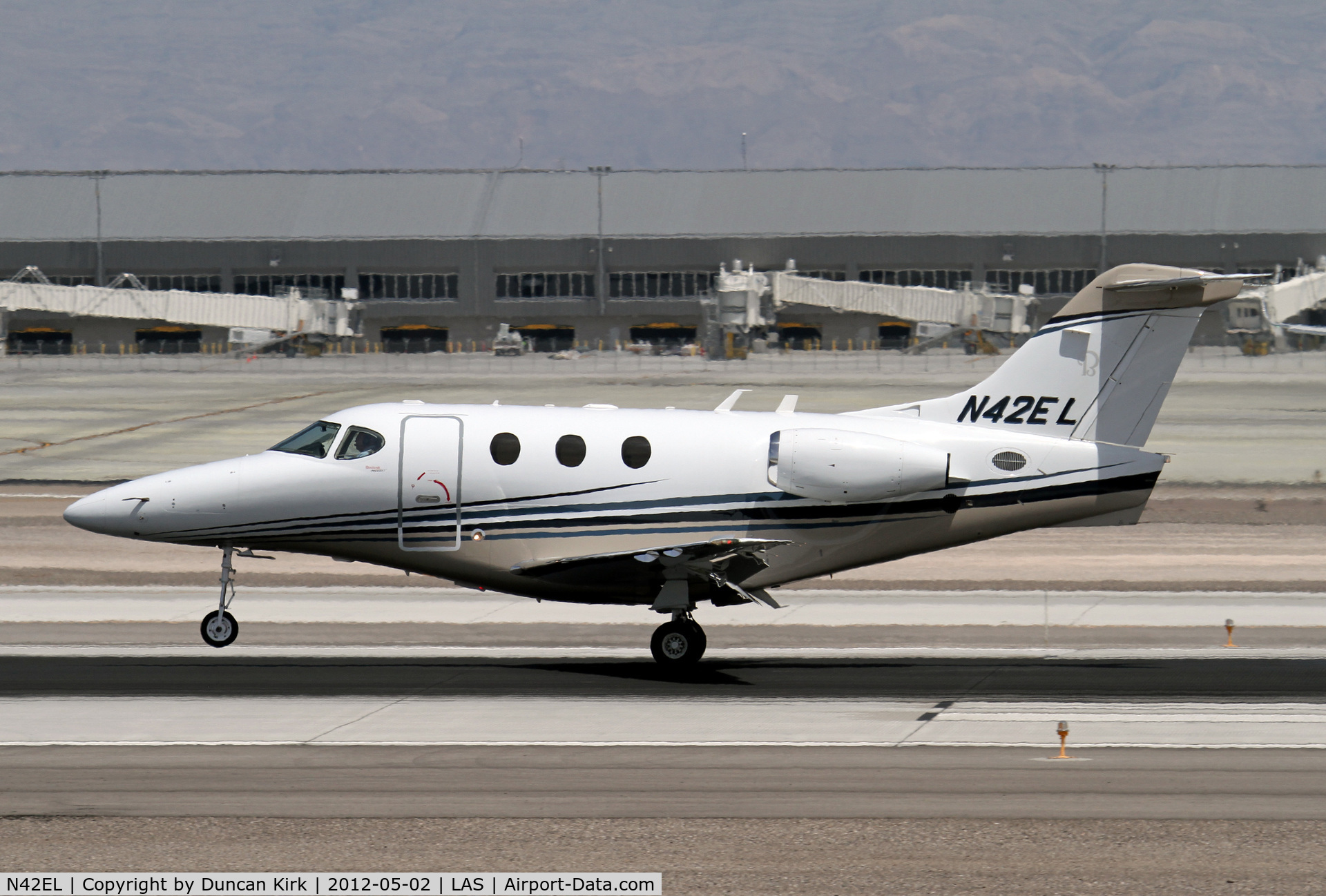 N42EL, Raytheon Aircraft Company 390 C/N RB-145, Touching down at Las Vegas