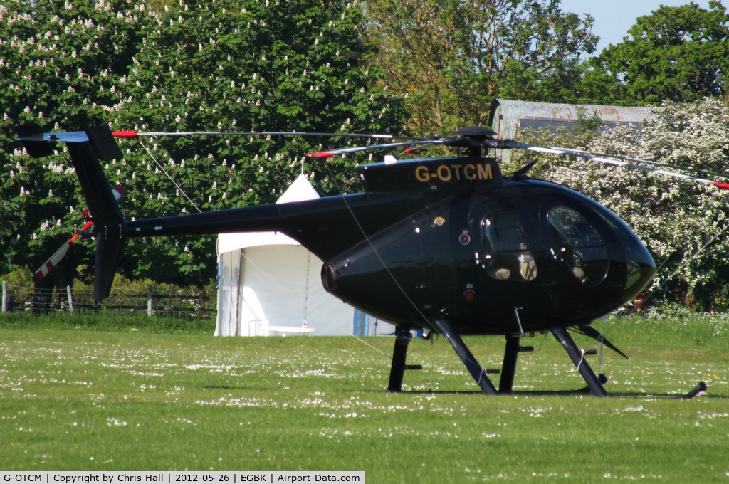 G-OTCM, MD Helicopters 369E C/N 0574E, at AeroExpo 2012
