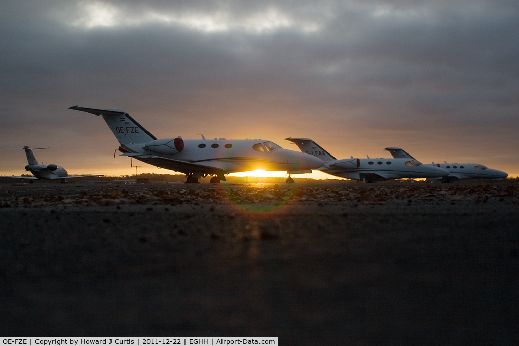 OE-FZE, 2009 Cessna 510 Citation Mustang Citation Mustang C/N 510-0217, Unusual early morning shot of three Citation Mustangs and a 525 on the Signature apron.