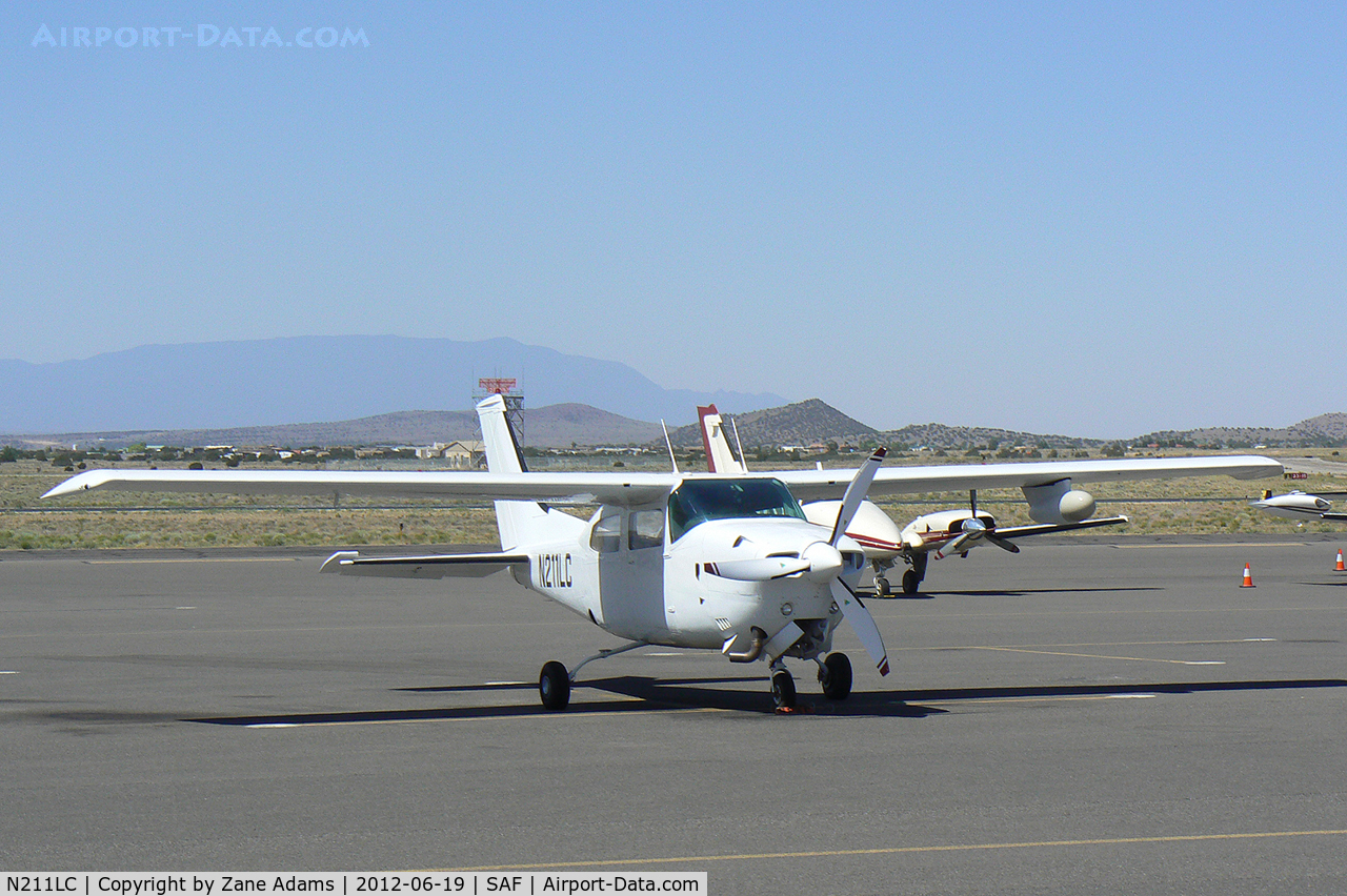 N211LC, 1974 Cessna T210L Turbo Centurion C/N 21060364, On the ramp in Santa Fe, New Mexico.