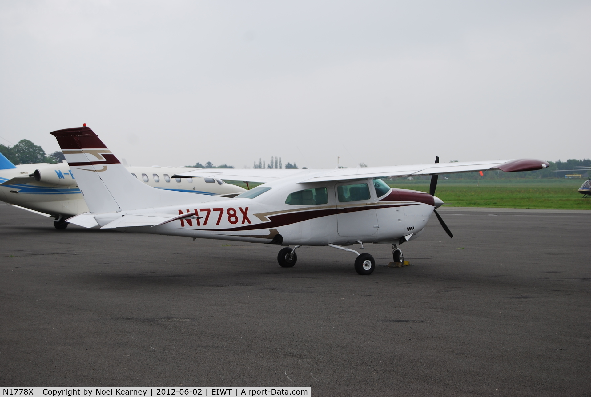 N1778X, 1975 Cessna 210L Centurion C/N 21060798, Seen parked on the apron at Weston.