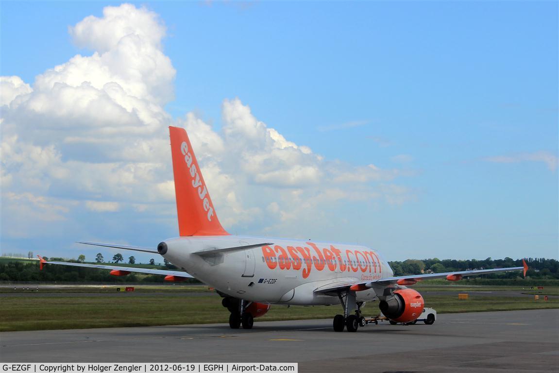 G-EZGF, 2011 Airbus A319-111 C/N 4635, Push back ceremony on apron.....