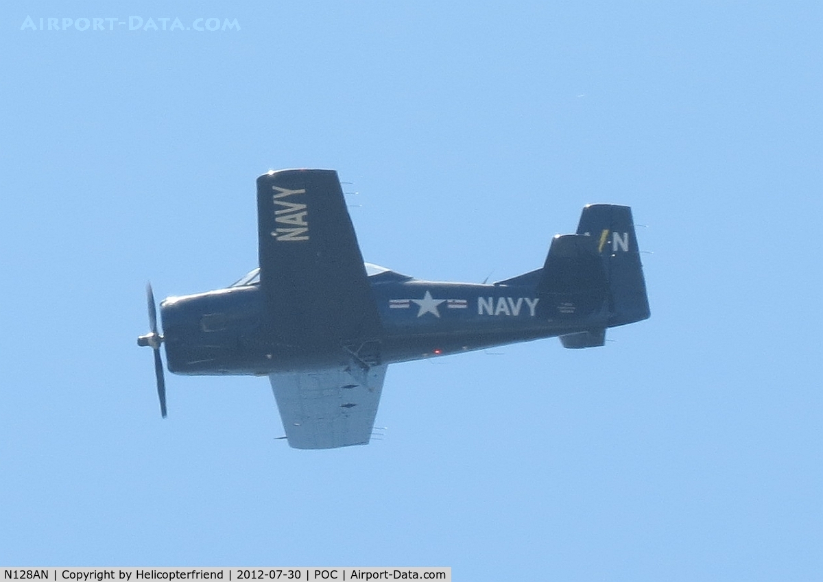 N128AN, 1951 North American T-28S Fennec C/N 96, Received permission to fly over active runway for a left downwind