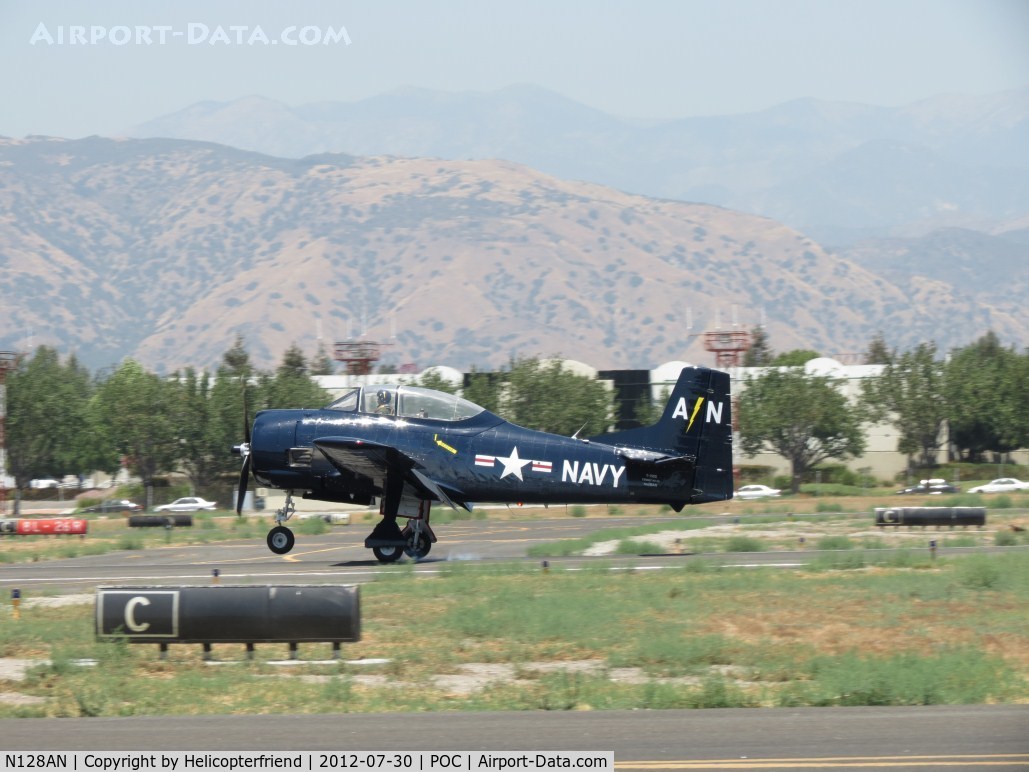 N128AN, 1951 North American T-28S Fennec C/N 96, On the runway, notice main gear tire smoke