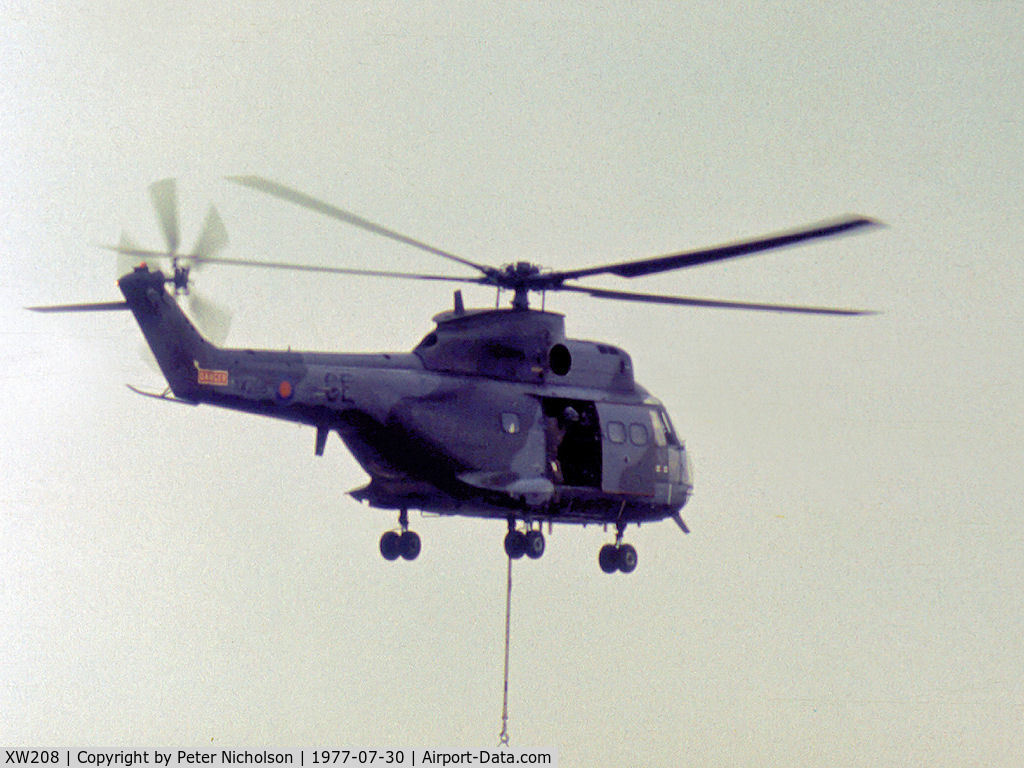 XW208, 1971 Westland Puma HC.1 C/N 1095, Puma HC.1 of 33 Squadron with under-slung load on display at the 1977 RAF Finningley Airshow.