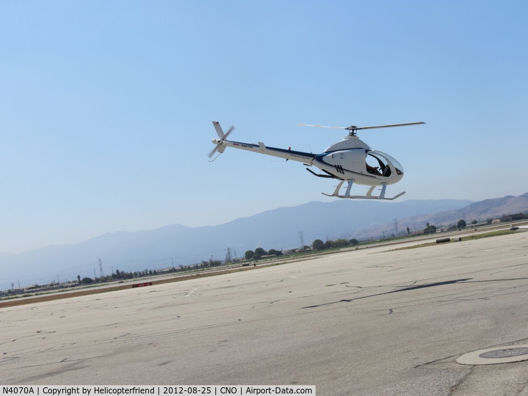 N4070A, 2004 Rotorway Exec 162F C/N 6345DS, Lifting off westbound